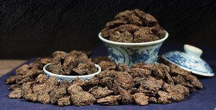 Чай Шу Пуэр Xin Yi Hao Старые чайные головы 250 г (на вес)